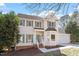 Charming two-story home with attached two-car garage, bay window and a well-manicured front yard at 205 Caniff Ln, Cary, NC 27519