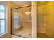Bathroom featuring a glass shower with a built-in seat and a convenient storage shelf at 2310 Woodbury Dr, Hillsborough, NC 27278