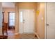 Bright entryway featuring a tile floor and coat closet at 2310 Woodbury Dr, Hillsborough, NC 27278