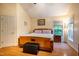 Main bedroom with a ceiling fan, windows, and a view of the outdoors at 2310 Woodbury Dr, Hillsborough, NC 27278