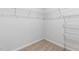 Spacious walk-in closet featuring wire shelving for maximizing storage and organization at 2558 Summersby Dr, Mebane, NC 27302