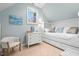Charming bedroom featuring a built-in daybed, white furniture, and a cozy window nook at 2617 Jones Ferry Rd, Chapel Hill, NC 27516