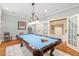 Game room with a pool table and ladder at 2617 Jones Ferry Rd, Chapel Hill, NC 27516