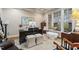 Comfortable office space featuring a large desk, natural light, and an elegant rug at 2617 Jones Ferry Rd, Chapel Hill, NC 27516