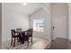 Bright dining room with wood floors, dining table and four chairs at 290 Forest Meadow Ln, Franklinton, NC 27525