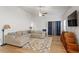 Inviting living room with a plush sectional sofa, ceiling fan, and neutral-toned rug for a comfortable space at 290 Forest Meadow Ln, Franklinton, NC 27525