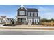Beautiful two-story home boasts charming curb appeal, a welcoming front porch, and professionally landscaped yard at 320 Catheys Crk Cir, Wendell, NC 27591