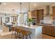 Gourmet kitchen with stainless steel appliances, a center island with seating, and modern cabinetry at 320 Catheys Crk Cir, Wendell, NC 27591