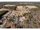 Aerial view of neighborhood with single Gathering homes and wooded area at 40 Ringneck Ct, Lillington, NC 27546