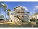 Home backyard featuring an elevated wooden deck with ceiling fan and fenced perimeter at 40 Ringneck Ct, Lillington, NC 27546