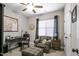 Cozy bedroom featuring a desk, chair and ottoman, soft carpet, and natural light from the window at 40 Ringneck Ct, Lillington, NC 27546