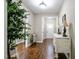 Inviting entryway featuring wood floors and neutral walls, leading to the rest of the home at 40 Ringneck Ct, Lillington, NC 27546