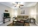 Inviting living room with comfortable sofa, side tables, and decor, perfect for relaxation and entertainment at 40 Ringneck Ct, Lillington, NC 27546
