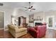 Spacious living room with a vaulted ceiling, fireplace, and hardwood floors at 40 Ringneck Ct, Lillington, NC 27546
