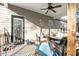 Inviting patio with comfortable seating, a ceiling fan, and stylish outdoor decor at 40 Ringneck Ct, Lillington, NC 27546