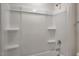 Bathroom featuring a bath tub and shower combination with bright lighting at 409 Citron St, Sanford, NC 27332