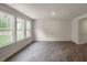 Open living room area boasting natural light and neutral wall colors at 409 Citron St, Sanford, NC 27332