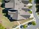 Aerial view of home featuring roof, lawn, and driveway at 4137 Strendal Dr, Cary, NC 27519