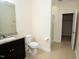 Bathroom featuring a granite vanity top and a glass-enclosed shower at 4137 Strendal Dr, Cary, NC 27519