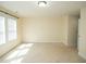Open bedroom featuring neutral carpet, walls and natural light at 4137 Strendal Dr, Cary, NC 27519