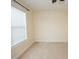 Clean, carpeted bedroom with a window with blinds to allow natural light at 4137 Strendal Dr, Cary, NC 27519