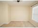 Carpeted bedroom featuring a window with blinds to allow natural light at 4137 Strendal Dr, Cary, NC 27519