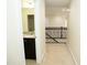 Hallway with carpeted floors, open doorways with views of the bathroom, stairway, and rooms at 4137 Strendal Dr, Cary, NC 27519