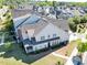 Beautiful townhome featuring well-maintained lawn, back porch, and charming architectural details at 4137 Strendal Dr, Cary, NC 27519
