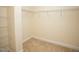 Empty walk-in closet with carpet and wire shelving at 4137 Strendal Dr, Cary, NC 27519