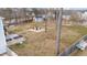 Aerial view of the spacious backyard with firepit and shed providing ample outdoor space at 415 Moonlight Dr, Fuquay Varina, NC 27526
