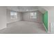 Spacious bedroom with carpeting and windows offering lots of natural light at 415 Moonlight Dr, Fuquay Varina, NC 27526
