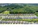 Aerial view of a residential neighborhood surrounded by a lush green forest at 428 Morgan Ridge Rd, Holly Springs, NC 27540