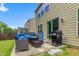 Back patio with grill and outdoor seating at 428 Morgan Ridge Rd, Holly Springs, NC 27540