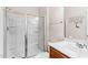 Clean bathroom with a glass-enclosed shower and modern fixtures, offering style and function at 428 Morgan Ridge Rd, Holly Springs, NC 27540