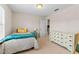 Bright bedroom with a comfortable bed and cute decor, creating a cozy and inviting space at 428 Morgan Ridge Rd, Holly Springs, NC 27540