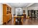 Traditional dining room with a wooden table and chairs, hutch, and hardwood floors at 428 Morgan Ridge Rd, Holly Springs, NC 27540