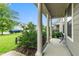 Charming front porch with columns and green landscaping at 428 Morgan Ridge Rd, Holly Springs, NC 27540