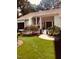 Charming home with well-manicured lawn and garden features, accented by an American flag at 4332 Blossom Hill Ct, Raleigh, NC 27613