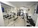 Bright home gym features mirrored walls and an array of exercise equipment for a complete workout at 4332 Blossom Hill Ct, Raleigh, NC 27613