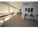 Bright upstairs hallway featuring a modern railing and open floor plan at 4332 Blossom Hill Ct, Raleigh, NC 27613