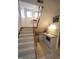 Staircase featuring a wet bar with a mini-fridge and sink underneath at 4332 Blossom Hill Ct, Raleigh, NC 27613