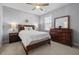 Comfortable bedroom offering a large bed and warm natural light at 4711 Marena Pl, Durham, NC 27707