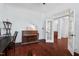 Office area with hardwood floors and piano at 4711 Marena Pl, Durham, NC 27707