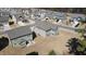 Aerial view showcasing a residential neighborhood with well-maintained lawns and varied home styles at 5 Misty Grove Trl, Franklinton, NC 27525