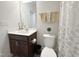 Cozy bathroom featuring a modern vanity, framed mirror, and neutral accents at 5 Misty Grove Trl, Franklinton, NC 27525