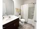 Bathroom featuring a modern vanity, framed mirror, and shower-tub combination at 5 Misty Grove Trl, Franklinton, NC 27525