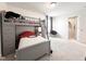 Cozy bedroom featuring a bunk bed with built-in storage and neutral carpet at 5 Misty Grove Trl, Franklinton, NC 27525