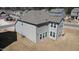 Two-story home featuring gray siding, a gray roof, and large windows providing ample natural light at 5 Misty Grove Trl, Franklinton, NC 27525