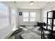 Bright and airy home office with plenty of natural light and space for productivity at 5 Misty Grove Trl, Franklinton, NC 27525