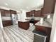 Spacious kitchen with island, stainless steel appliances, and ample countertop space at 5 Misty Grove Trl, Franklinton, NC 27525